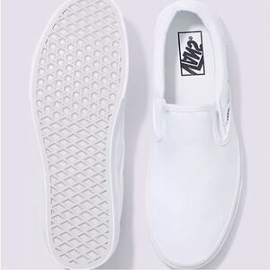 Vans white slip ons